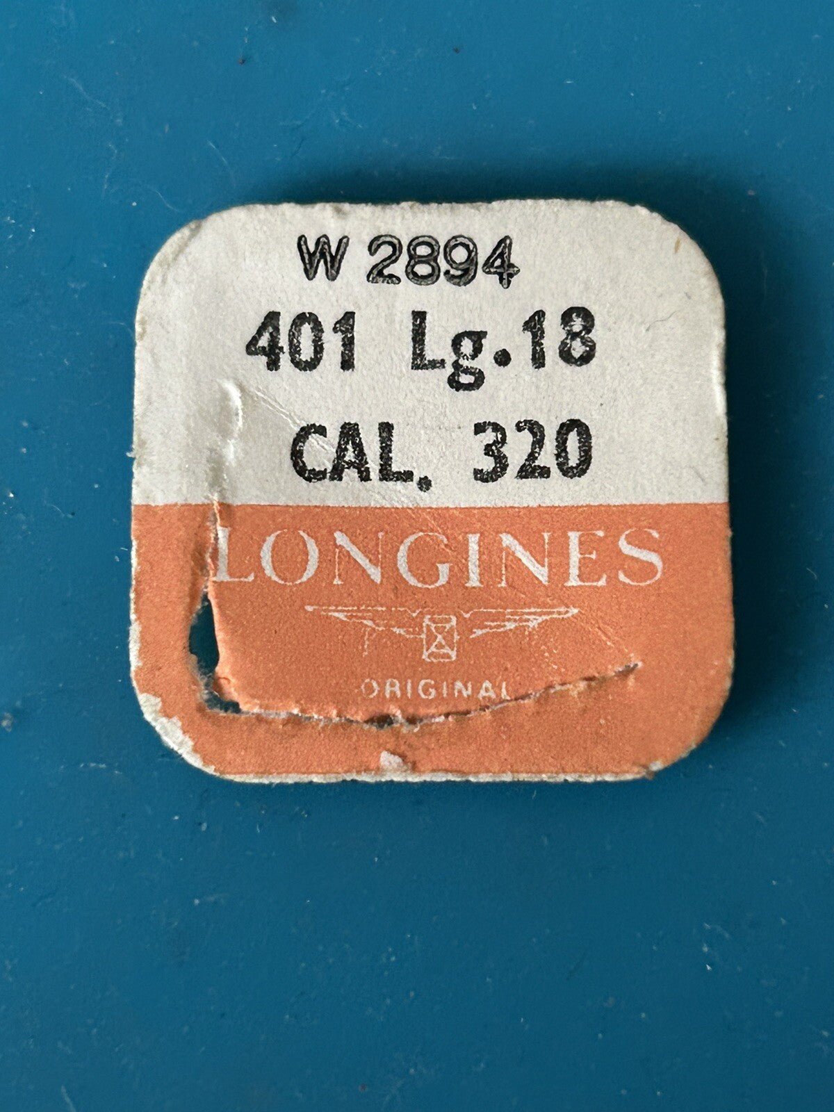 406077