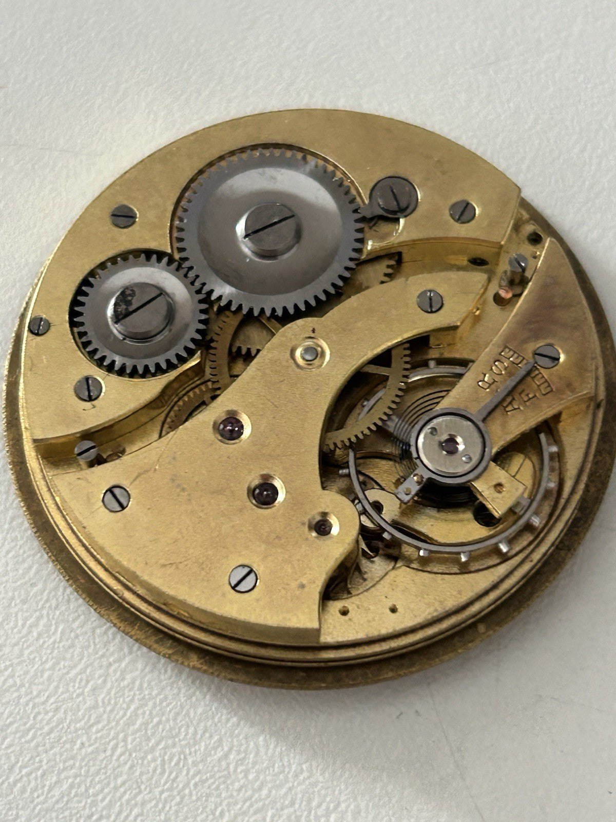 406025